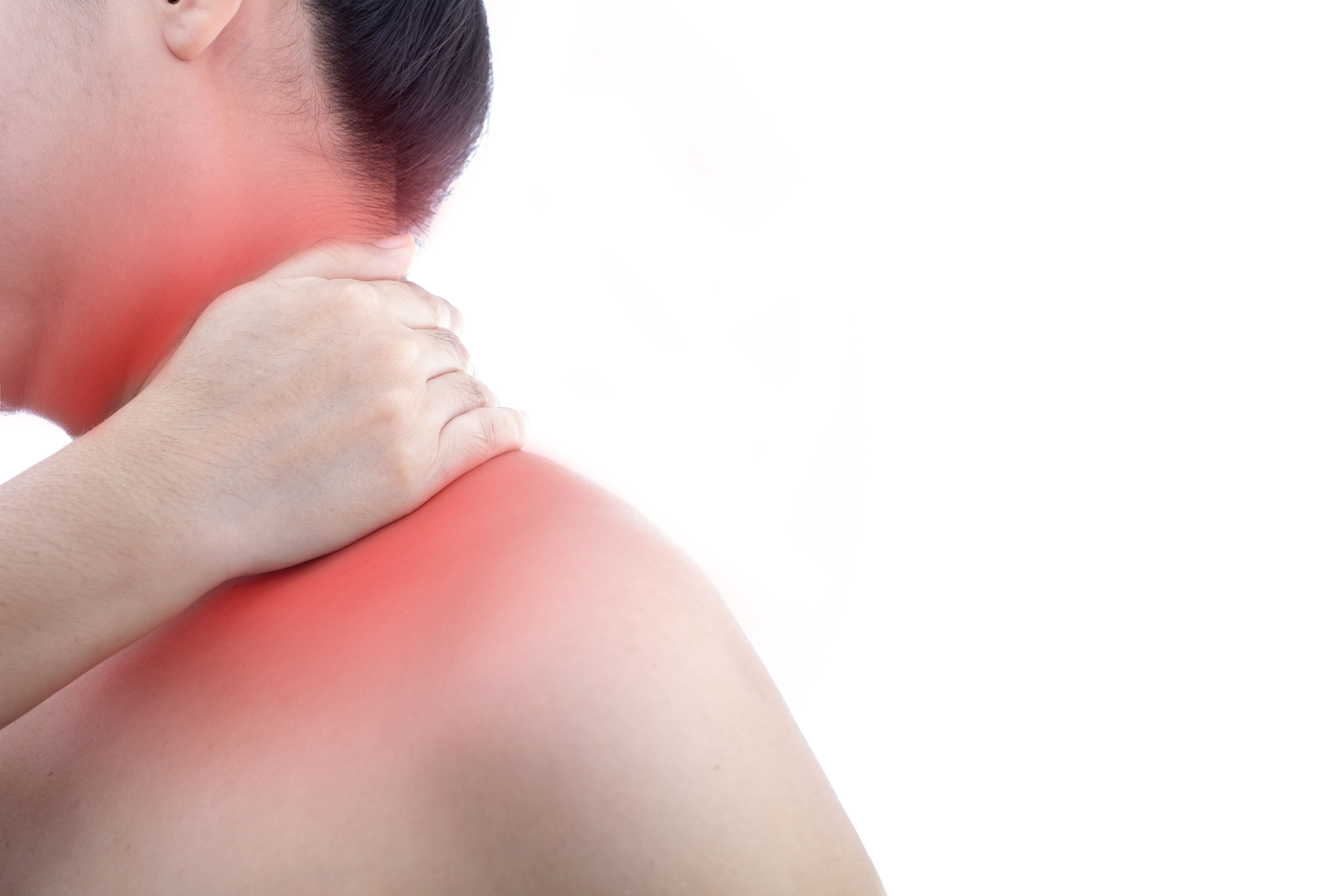 Woman holding her sore neck painful area highlighted in red