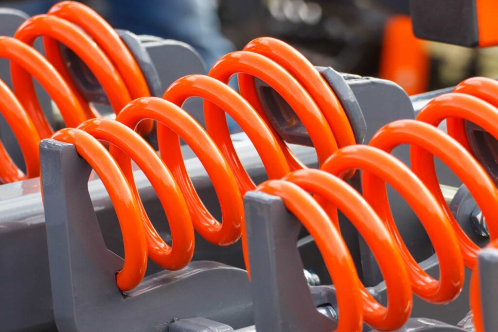 image of orange springs to represent hip cartilage. hip pain