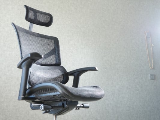 Ergonomic Office chair in modern office interior. Workplace and object concept.