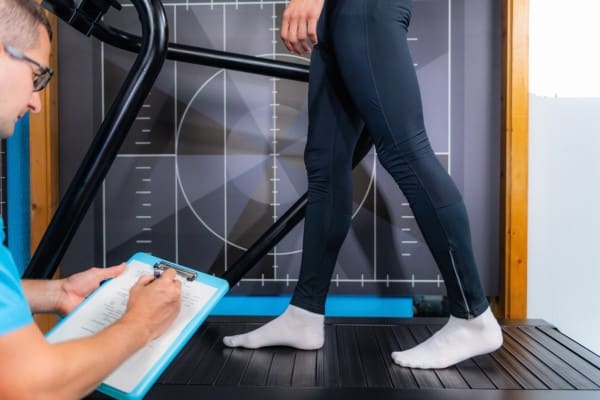image of a patient getting their Running or gait analysis on a treadmill